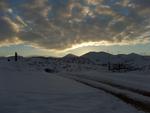 Sunset Comes Early on a Snowy Bowen Ranch Road