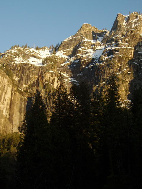 Snowy Yosemite Cliffs and Waterfall