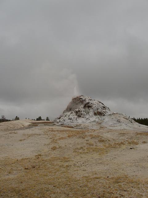 White Dome Geyser Erupting on a Gray Day