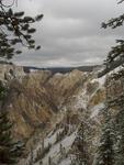 Grand Canyon of the Yellowstone River with fresh snow and threatening clouds